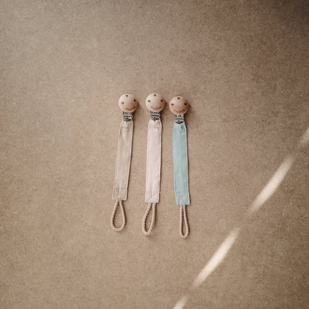    Blush Fabric Pacifier Clip by Mushie